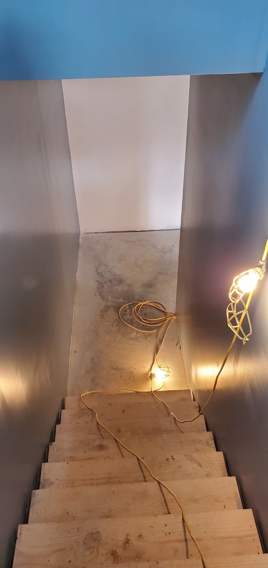 Interior staircase during construction with drywall