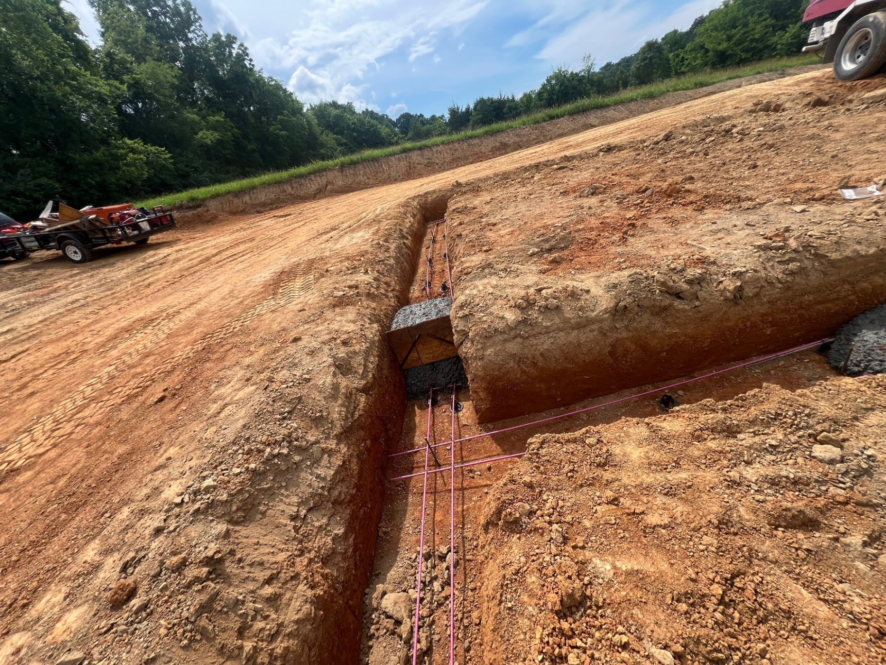 Foundation footings with rebar and concrete