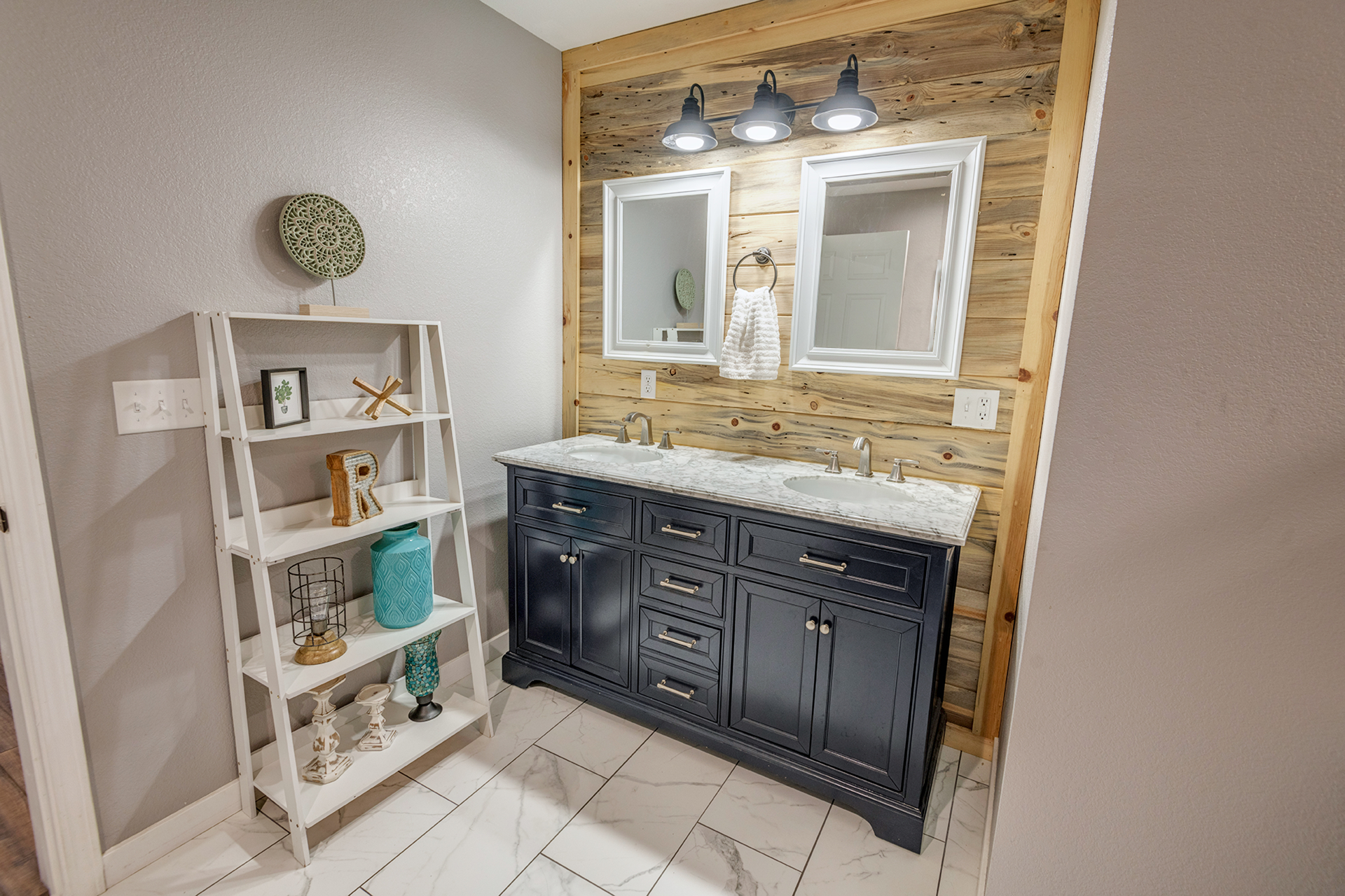 Turner Hill bathroom with rustic wood accent wall and double vanity